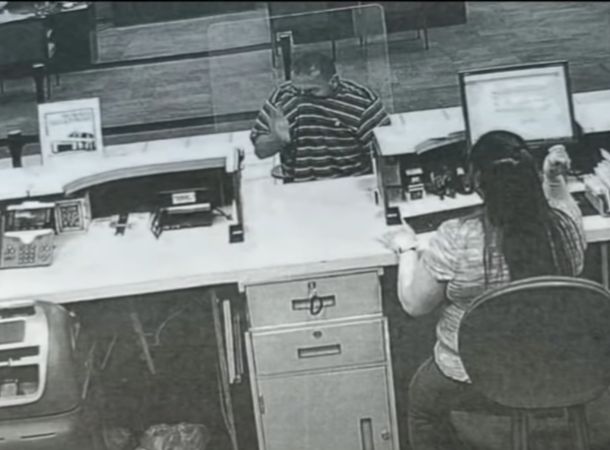 Surveillance footage shows an attempted bank robbery.