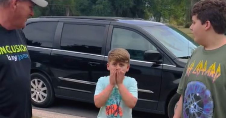 A young boy is surprised when his parents reveal their new home.