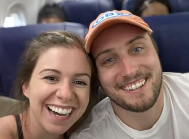 Nurse Emily Raines and her boyfriend on an airplane home to Baltimore. 