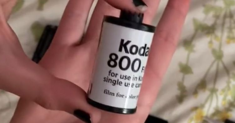 A roll of film from a vintage disposable camera.