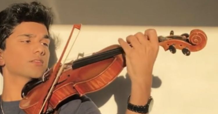 Musician Joel Sunny performs a Taylor Swift song on violin.