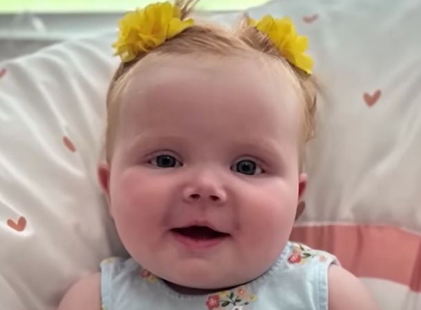 Baby Zoey is smiling in her new home with her firefighter dad.