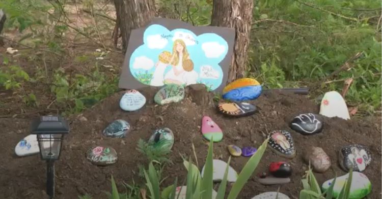 Painted rocks from friends and well-wishers decorate the garden.