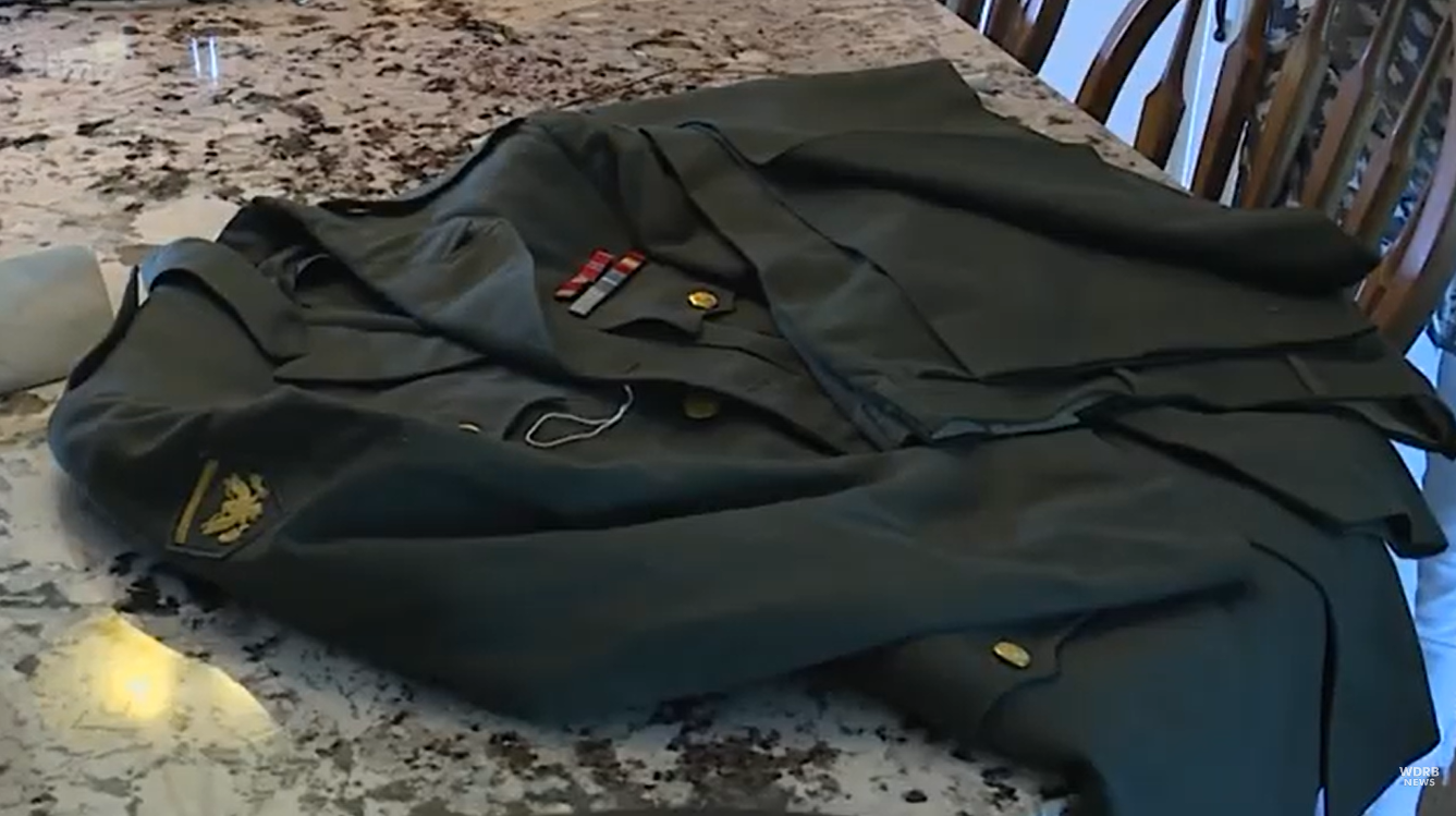 Howard Pennington's Army uniform lying on Luann Palmer's counter.