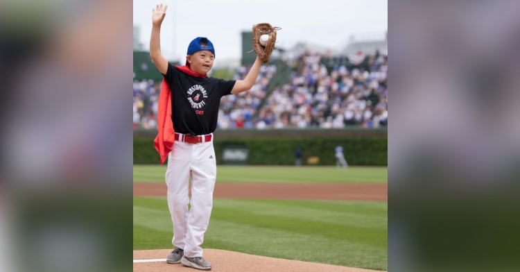Cooper Murray prepares to throw the first pitch at Fenway Park.