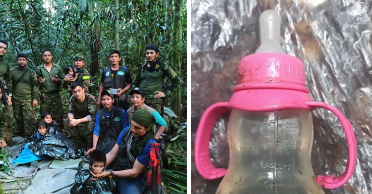 the kids with their rescuers on the left, a baby bottle sitting on a plastic tarp on the ground on the right