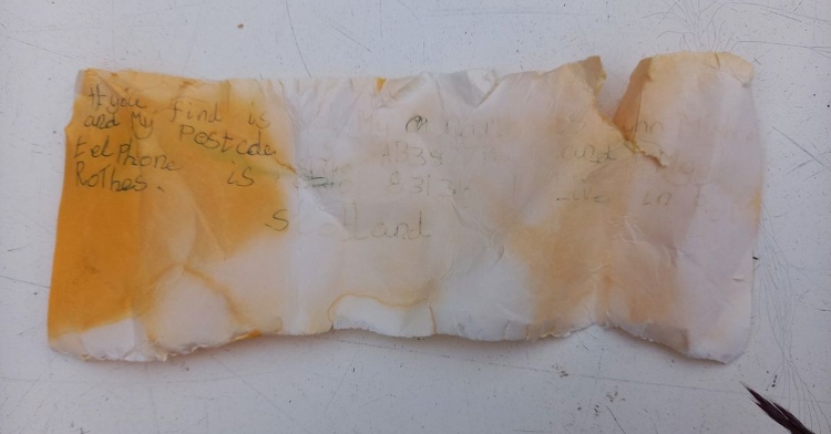 25 year old note written by Lynn Gardner. It's faded and a bit orange/yellow in spots.