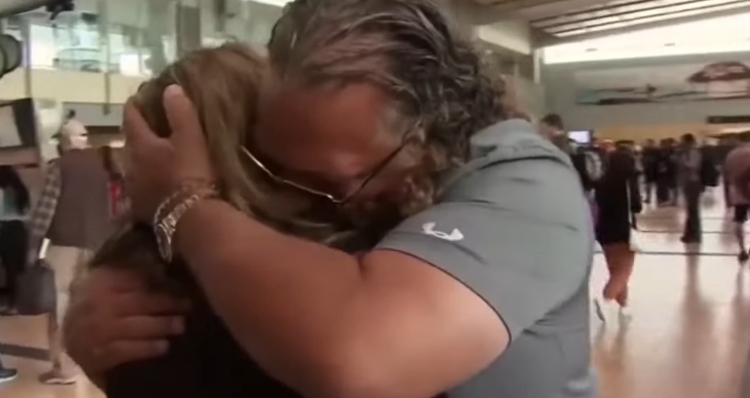 David Aguirre hugs sister Janice Dunn