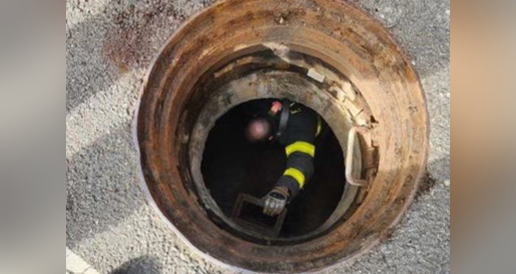 Firefighter entering sewer searching for 5 lost kids