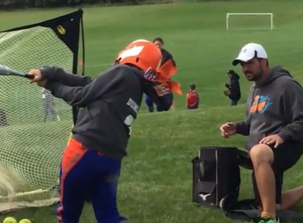 Zach and Madison spend their summers practicing softball.