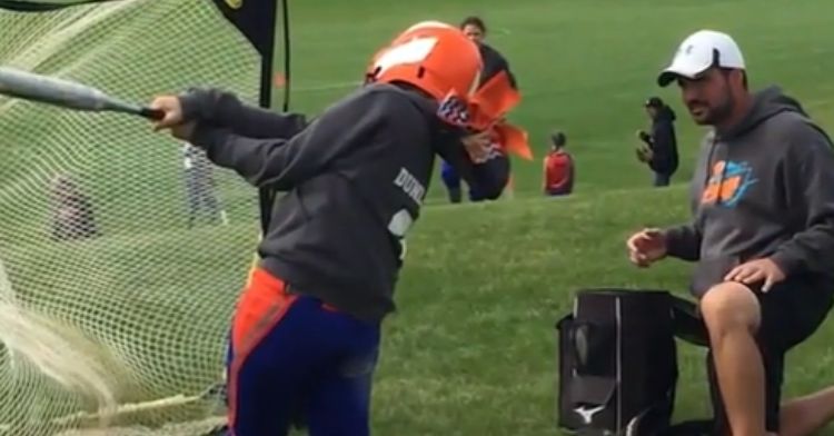 Zach and Madison spend their summers practicing softball.