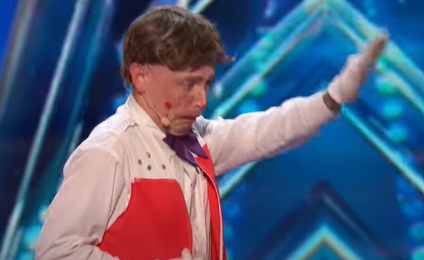Papayaso performing an elephant impersonation for AGT