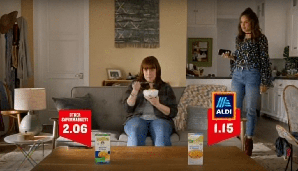 Roommates discuss mac & cheese in ALDI ad.