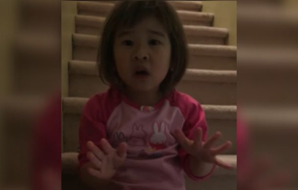 Marriage Advice from a 6-year-old. Image shows a small child talking to her mother with serious facial expressions and hand gestures to convey her message.