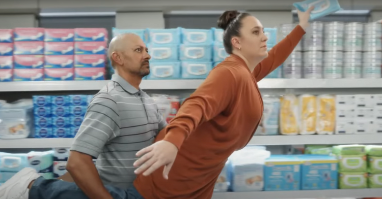 Aldi ad featuring a couple dancing in supermarket.