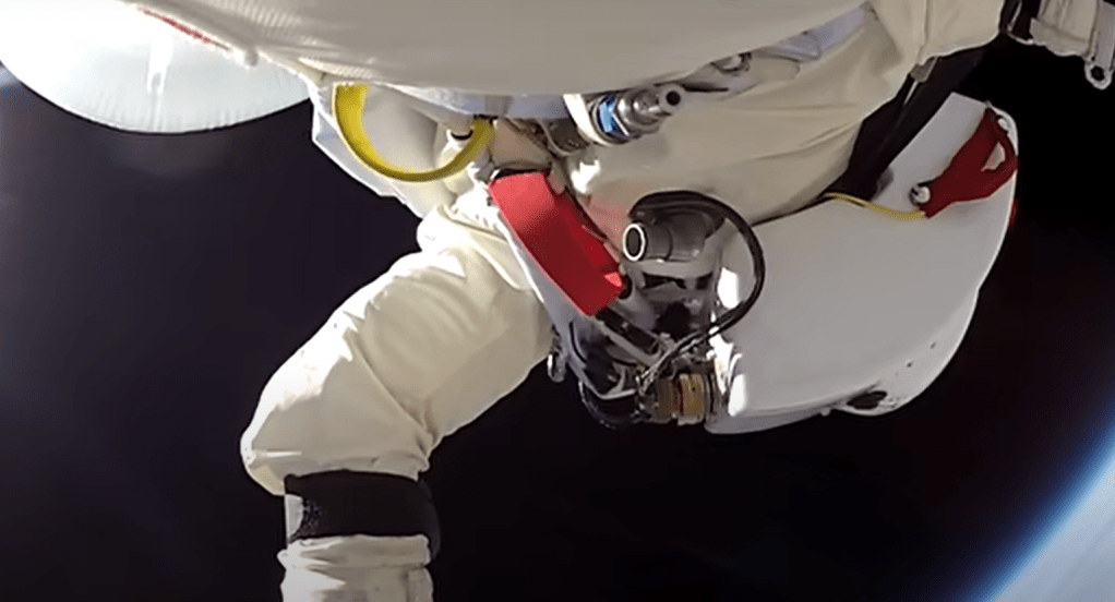 Felix Baumgartner falling through the sky in a spacesuit