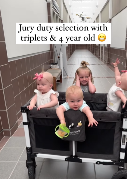 Torrey's three triplets stand in their portable crib while her then 4-year-old stands next to them and covers her ears. Text on the image reads "Jury duty selection with triplets & 4 year old."