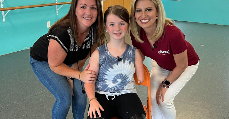 Hannah poses with her mother and dance teacher.