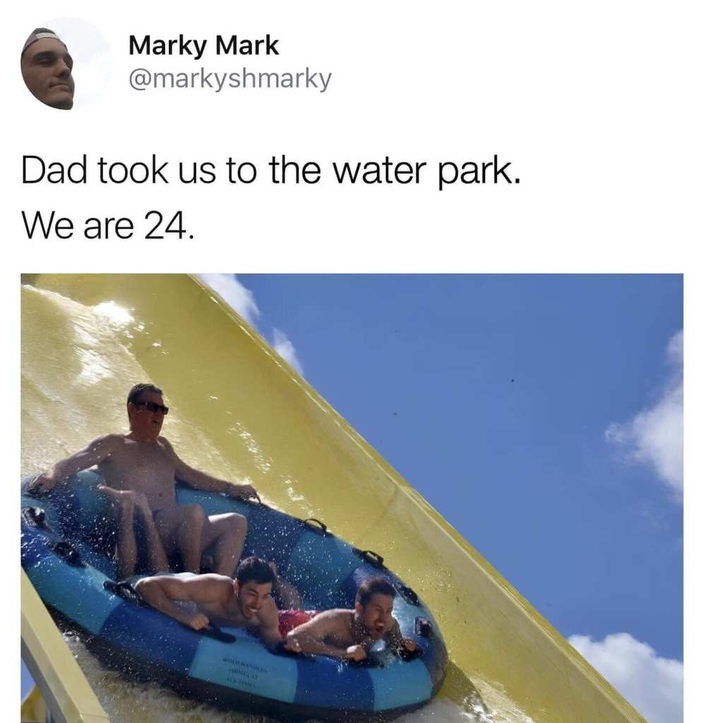men in waterslide at waterpark shown in tube