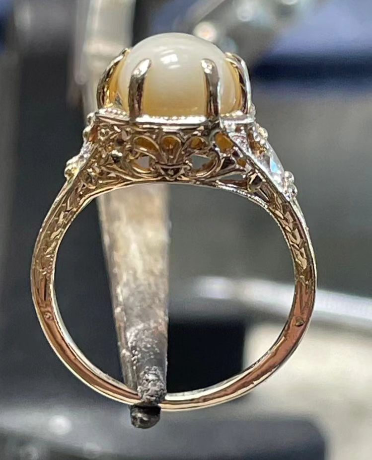 Close up of a side-view of the pearl ring Sandy and Ken got made. 
