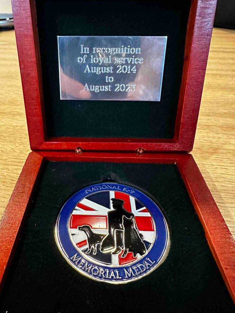 Medal in recognition of loyal service for drug-sniffing dog.