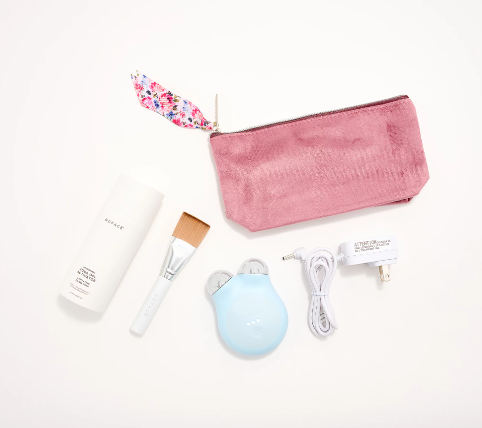 NuFACE Mini+ Facial Toning Device w/ Aqua Gel, Brush & Bag aesthetically on display.