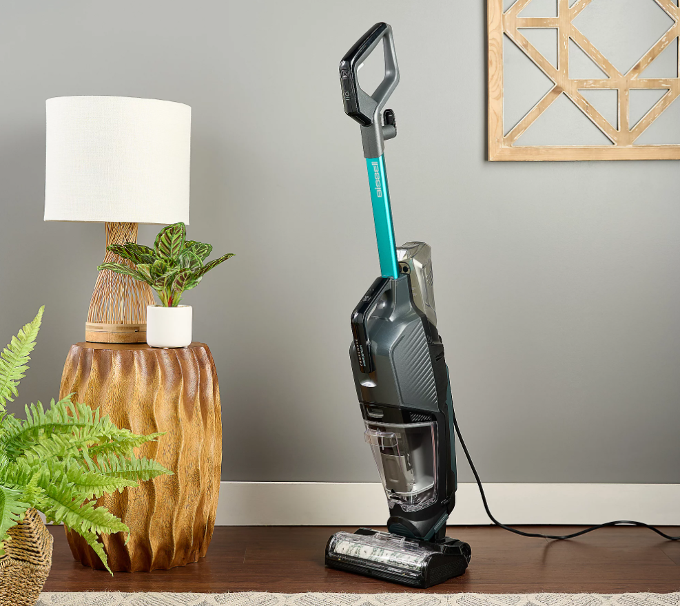 BISSELL CrossWave HydroSteam Deluxe 3-in-1 Floor Cleaner in Electric Blue in a living room.