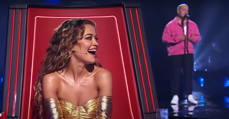 Rita Ora gasps as her song takes the stage on "The Voice".