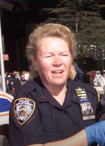 Close up of Officer Moira helping rescue people on the day of the 9/11 attacks.