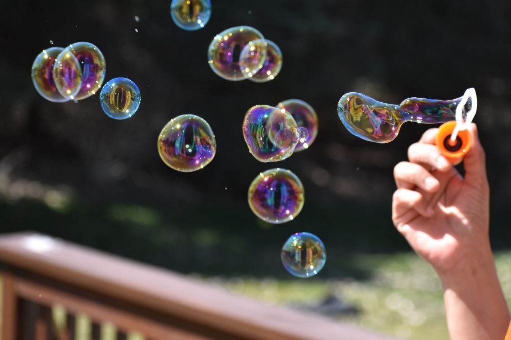 Blowing bubbles in the summertime is one of life's simple joys.