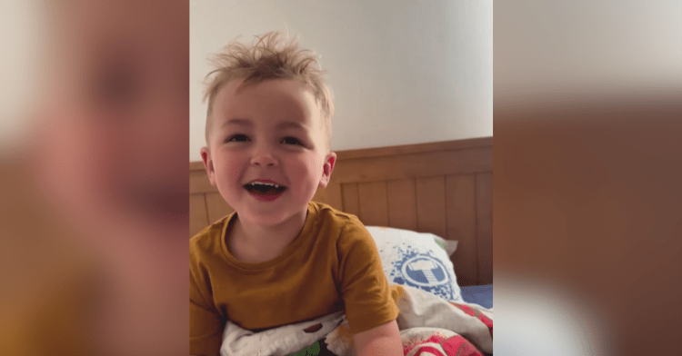 Child laughing over his pet moth's name.