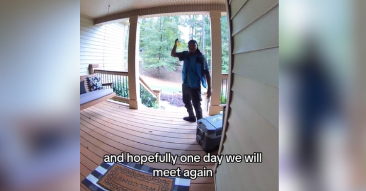 View from of a home's security camera. A delivery driver stands near the front porch stairs near a cooler. He's raising a drink in the air. Text on the image reads: We are so heartbroken that it's our favorite driver's last day. More text shows what the man is saying in that moment: and hopefully one day we will meet again.