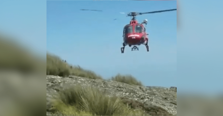 helicopter on top of mountain
