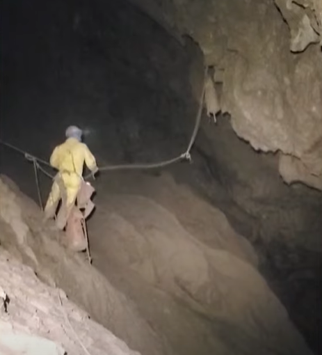 Someone descending inside of Morca Cave.