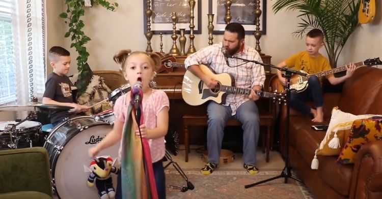 This adorable family band loves to rock out together.
