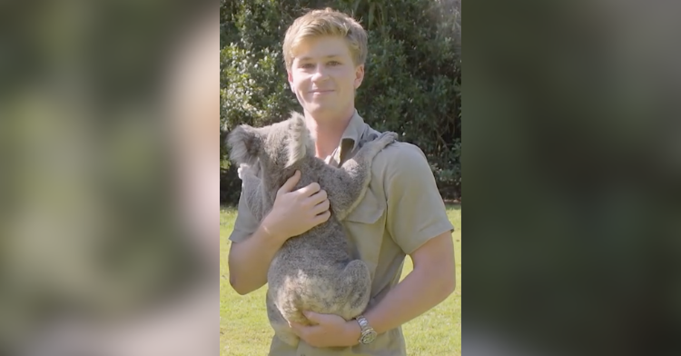 Robert Irwin with a koala