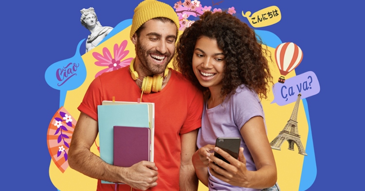 A man and a woman smile wide as she shows him her phone which has Rosetta Stone on it. Behind them are various iconic images from around the world and text in various languages.