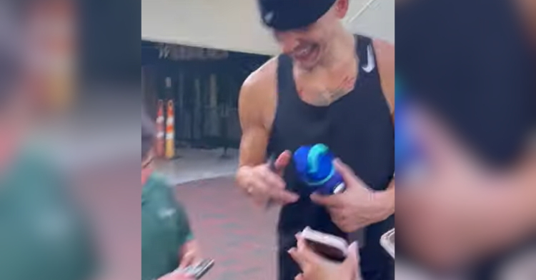 tyler herro holds water bottle