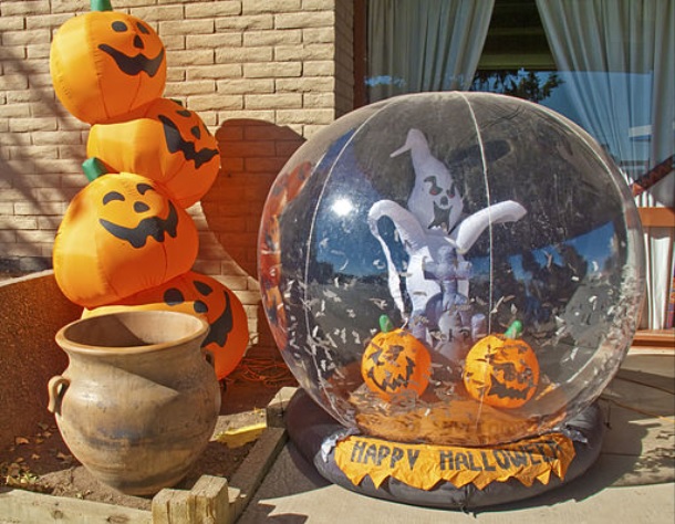Image shows a front porch decorated for Halloween