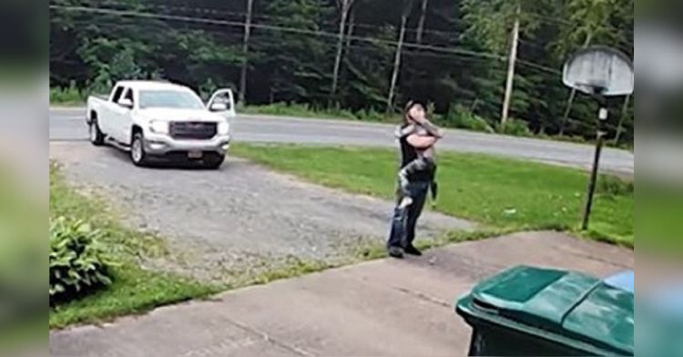 A young boy stops his dad for "just one more hug." Image shows a dad and his son sharing a hug before dad goes to work.