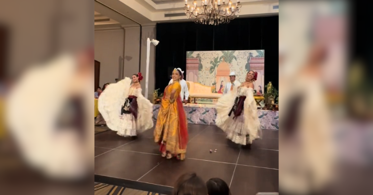 Hispanic and bengali dancers performing at wedding