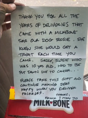 Although the note had sad news inside, John was touched. 