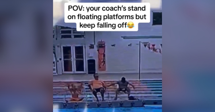 View of three people sitting in chairs on a floating platform on an indoor pool. One person is flailing their arms as they try to not fall in the water. Text on the image reads: POV: your coach's stand on floating platforms but keep falling off.