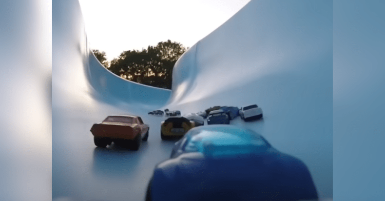 hotwheels toy car on a water slide