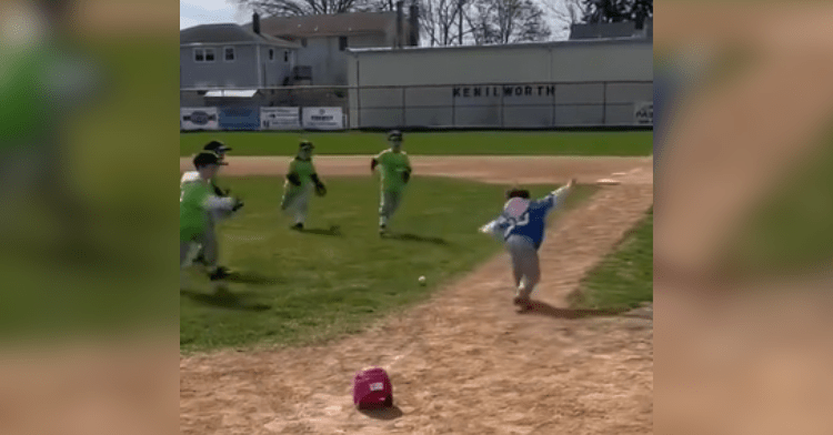 little girl runs on baseball team