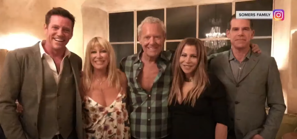 Suzanne Somers and Alan Hamel smile as they pose with their three adult children.