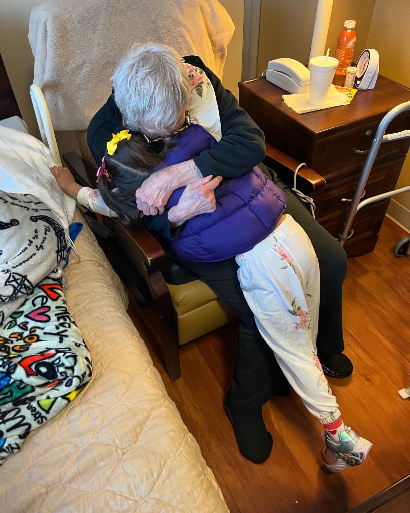 shawn's daughter hugging her grandmother