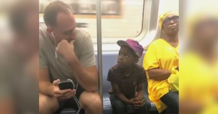 A heartwarming moment on subway when a man and young boy connect.