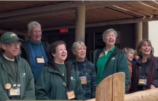Brookfield Zoo staff singing "Happy Birthday" to Arnieta the giraffe.
