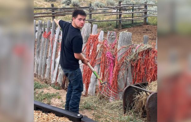 Feeding the horses is a chore that the boys help with around the ranch.